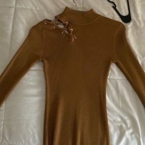 Long sleeve brown dress no stains and a tired slit on shoulder really cute